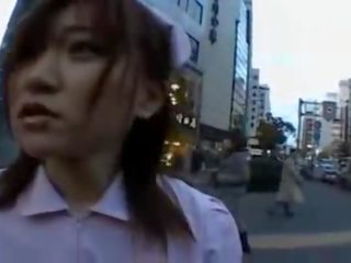 Naughty Asian adolescent is pissing in public